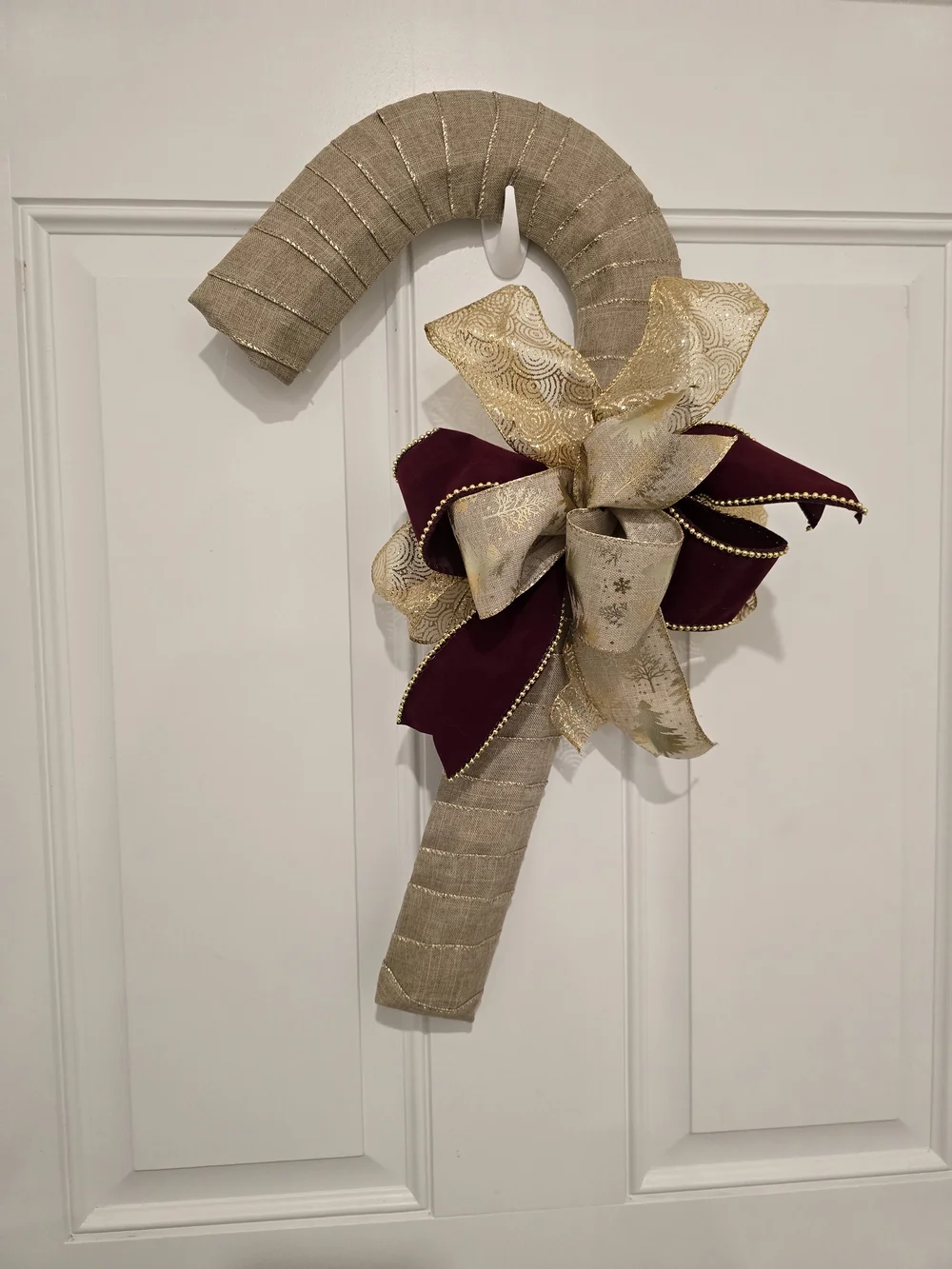 Holiday Candy Cane Door Decor with Gold and Burgundy Bow